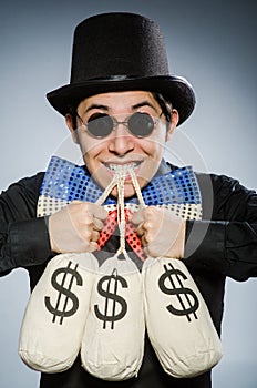 The funny man with money dollar sacks