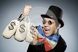 The funny man with money dollar sacks