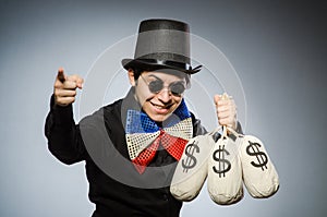 The funny man with money dollar sacks