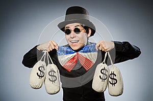 The funny man with money dollar sacks