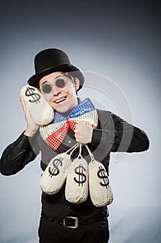 Funny man with money dollar sacks