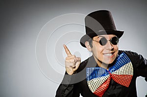 The funny man with sunglasses and vintage hat