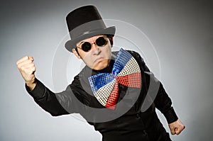 The funny man with sunglasses and vintage hat