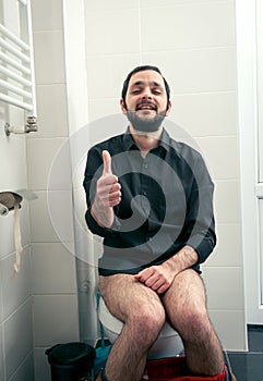 Funny man in toilet