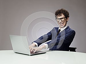 Funny man using laptop