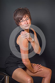 Funny mature woman in mini dress
