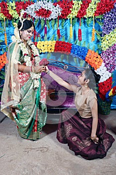 Funny moment with bride and her sister. Funny moment. Candid wedding moment. Sister is trying to propose her elder sister.