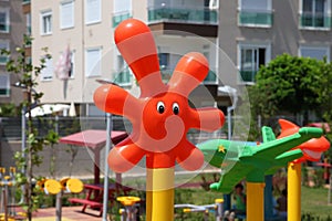 Funny orange blot on the playground in the sun