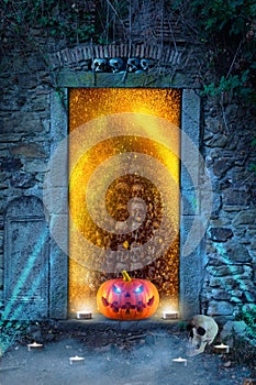 A funny orange pumpkin with glowing eyes in front of hell`s door