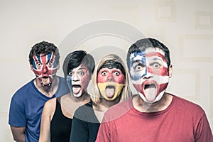 Funny people with flags on faces