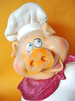 Funny pig with chef hat photo