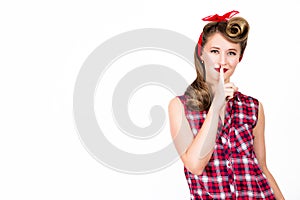 Funny pin-up woman says quiet