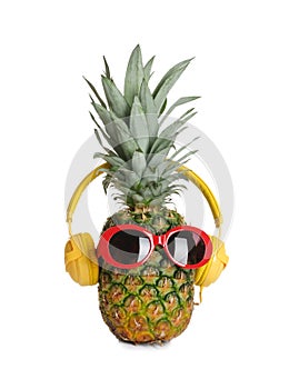 Funny pineapple with headphones and sunglasses