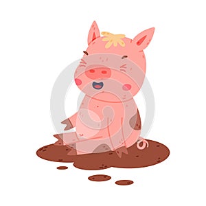 Funny Pink Piggy Character with Hoof Sitting in Brown Mud Puddle and Snorting Vector Illustration photo