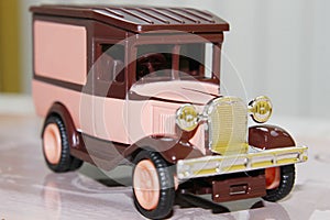 Funny pink vintage toy car