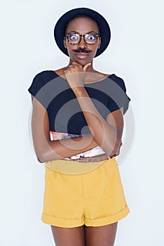 Funny, portrait and black woman with mustache in studio with hipster fashion and crazy person in background. Silly, nerd