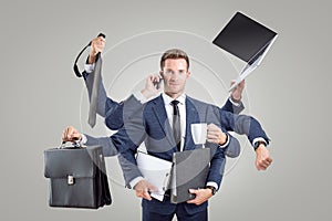 Funny portrait of a businessman with many arms