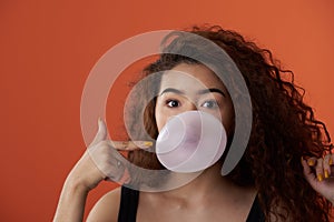 Funny portrait of girl with bubble gum