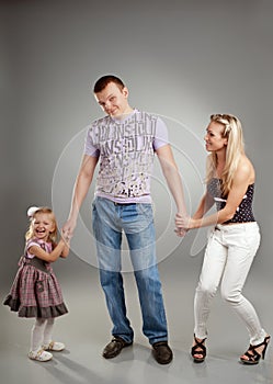 Funny portrait of a happy family standing together