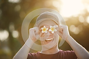 Funny portrait of happy traveler in tropical destination photo