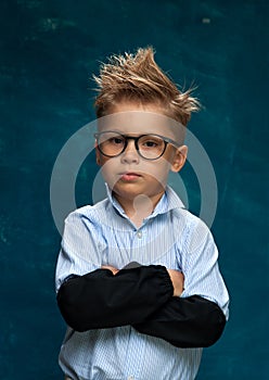 Funny portrait of little child with eyeglasses