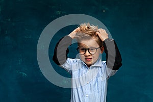 Funny portrait of little child with eyeglasses