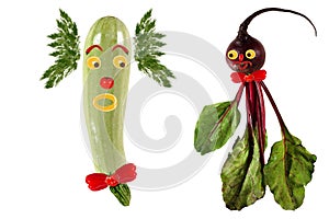 Funny portrait made of zucchini, beet and fruits