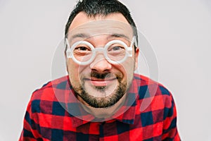 Funny portrait of a man with glasses