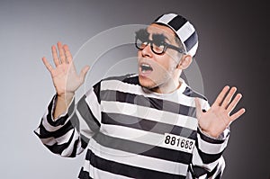 The funny prisoner with faked eyebrows in striped
