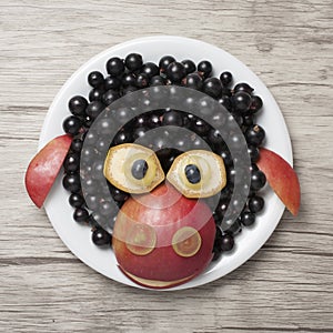 Funny ram made with currant, banana and apple