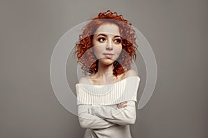Funny red curly girl with big head and funny hairstyle. Caricature stylization of female logic
