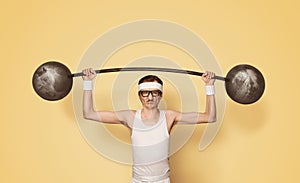 Funny retro sport nerd lifting weights