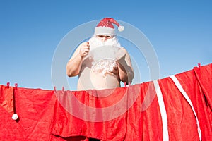 Funny Santa. Daily affairs. Preparing for the holiday.