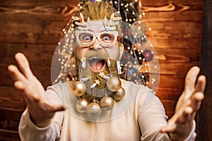 Funny Santa. Christmas preparation - man celebrating New Year. Happy Santa dressed in winter clothing think about