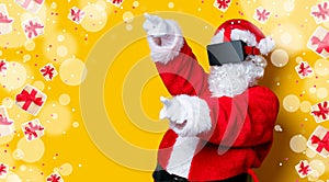 Funny Santa Claus have a joy with VR glasses