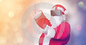 Funny Santa Claus have a joy with VR glasses