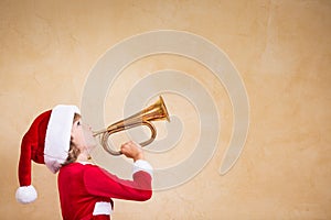 Funny Santa kid with drawn megaphone