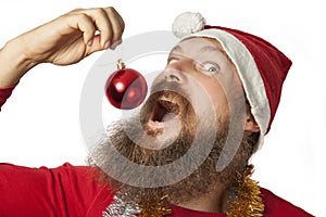 Funny santa with red Christmas Ball