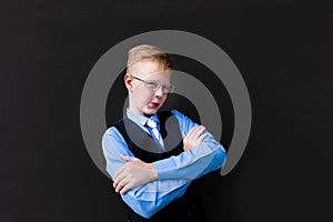 Funny schoolboy at the school board