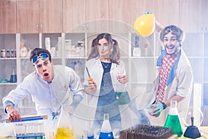 Funny scientists making experiment