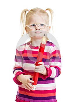 Funny serious kid in eyeglasses with red pencil
