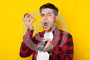 Funny Shocked Guy Eating Pizza Holding Remote Control Watching Tv