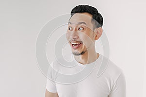 Funny shocked and surprised face of man isolated on white background.