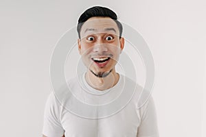 Funny shocked and surprised face of man isolated on white background.