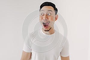 Funny shocked and surprised face of man isolated on white background.