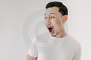 Funny shocked and surprised face of man isolated on white background.