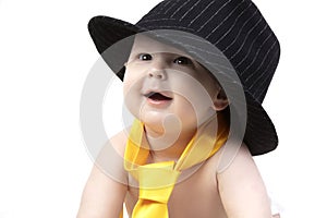 Funny six month old baby in elegant clothes