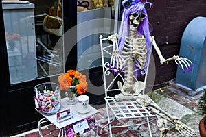 Funny skeleton as outdoor Halloween decoration.