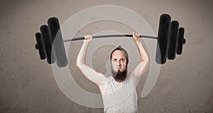 Funny skinny guy lifting weights