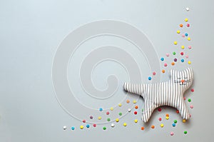 Funny sleeping cat toy with closed eyes photo